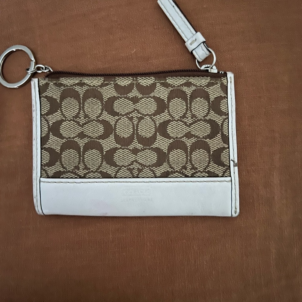 Coach mini cloth and white Leather 2”by 3” case with key ring.